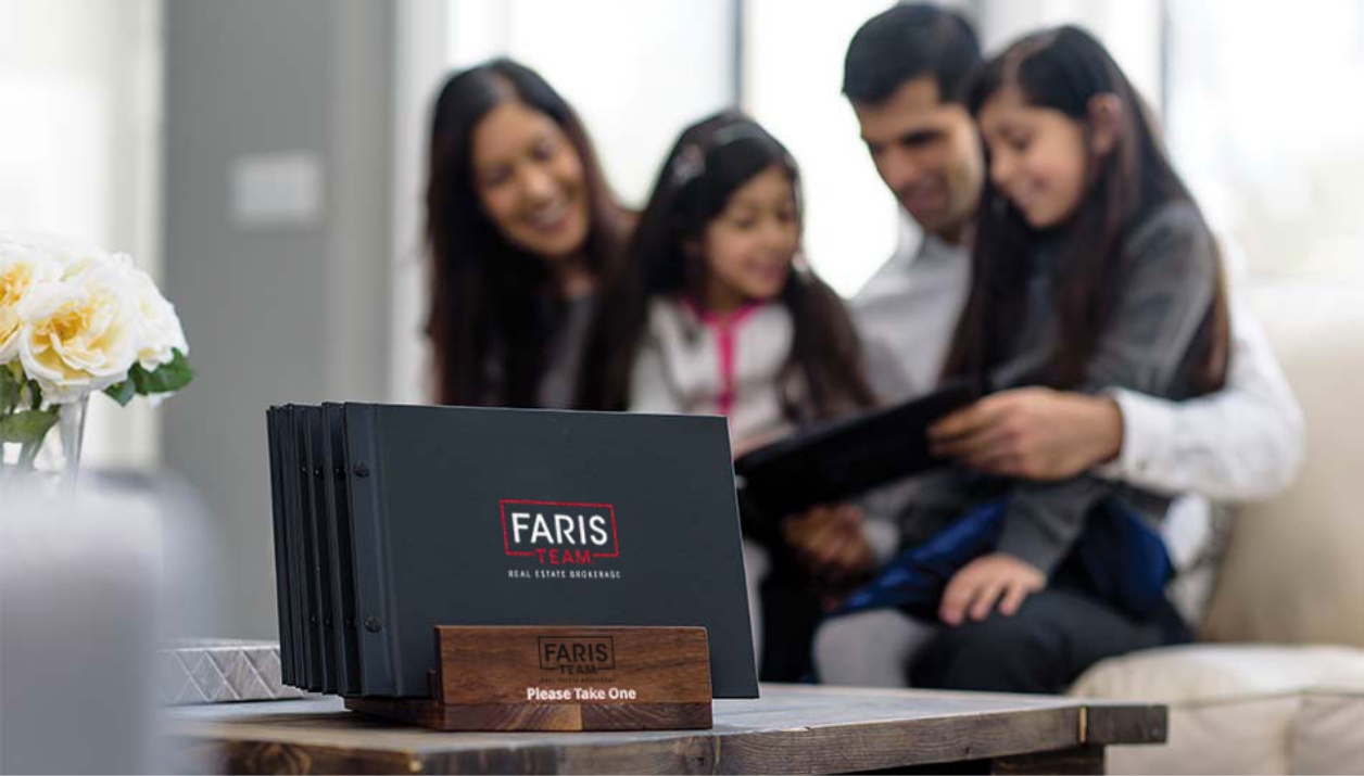 Faris Team feature books in a wooden stand